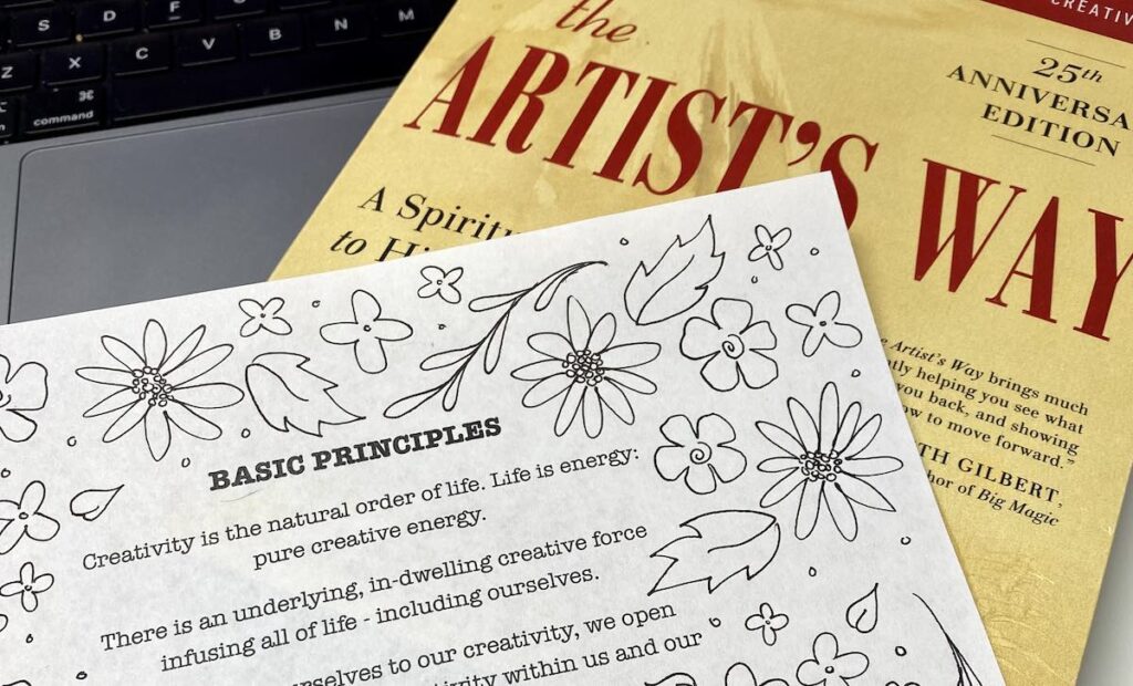 photo of The Artist's Way book and printout of the Basic Principles.