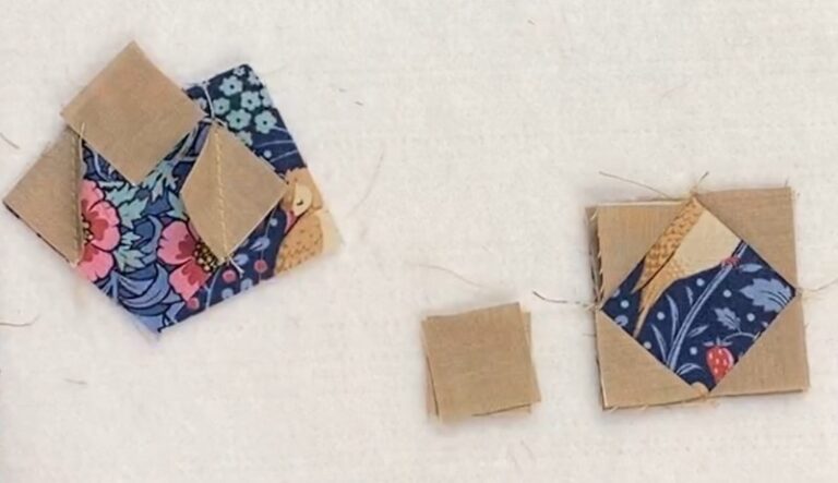 small squares of fabric used to make a blue berry