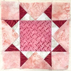 Aunt Addie's Album quilt block in shades of pink