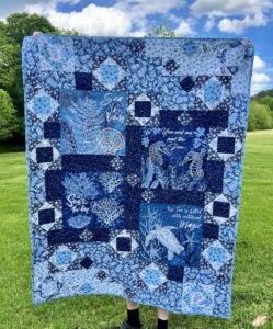 Sea Magic quilt in blues and white featuring fabrics from Riley Blake's Ocean Oasis collection