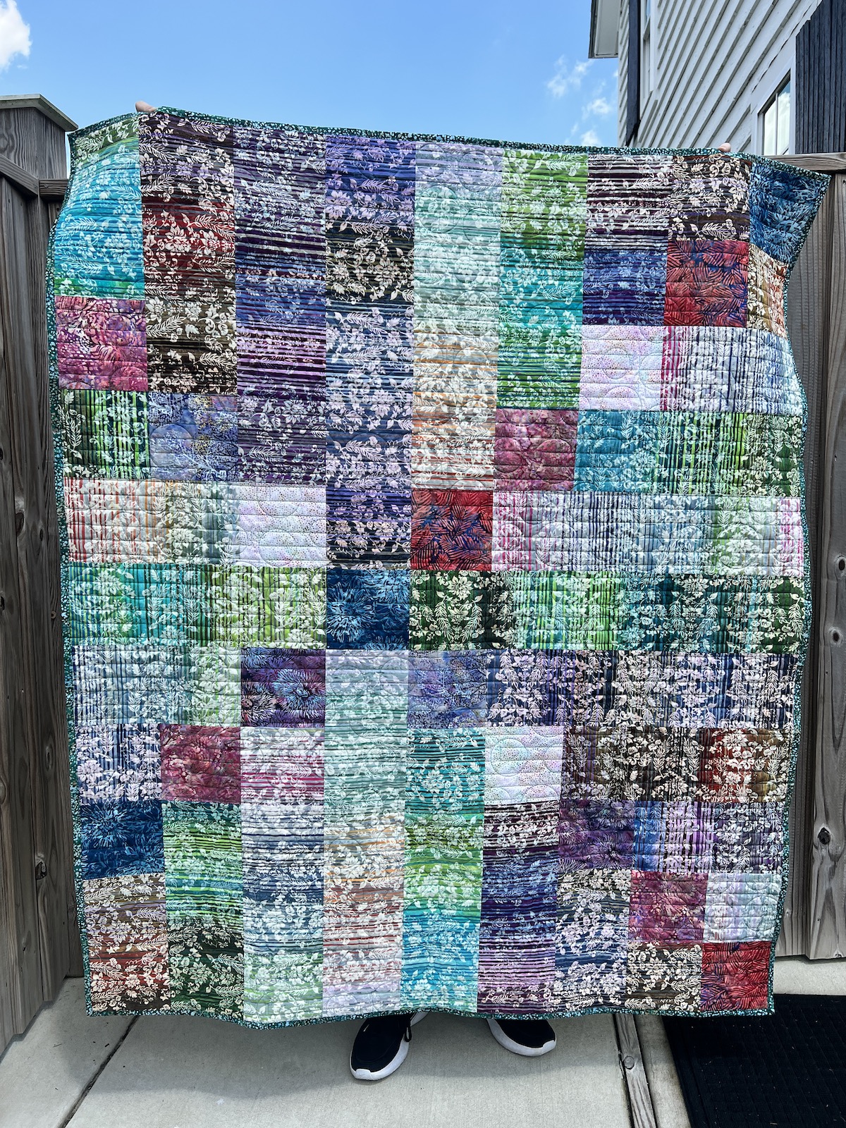 Lap sized quilt in colorful batiks fabrics