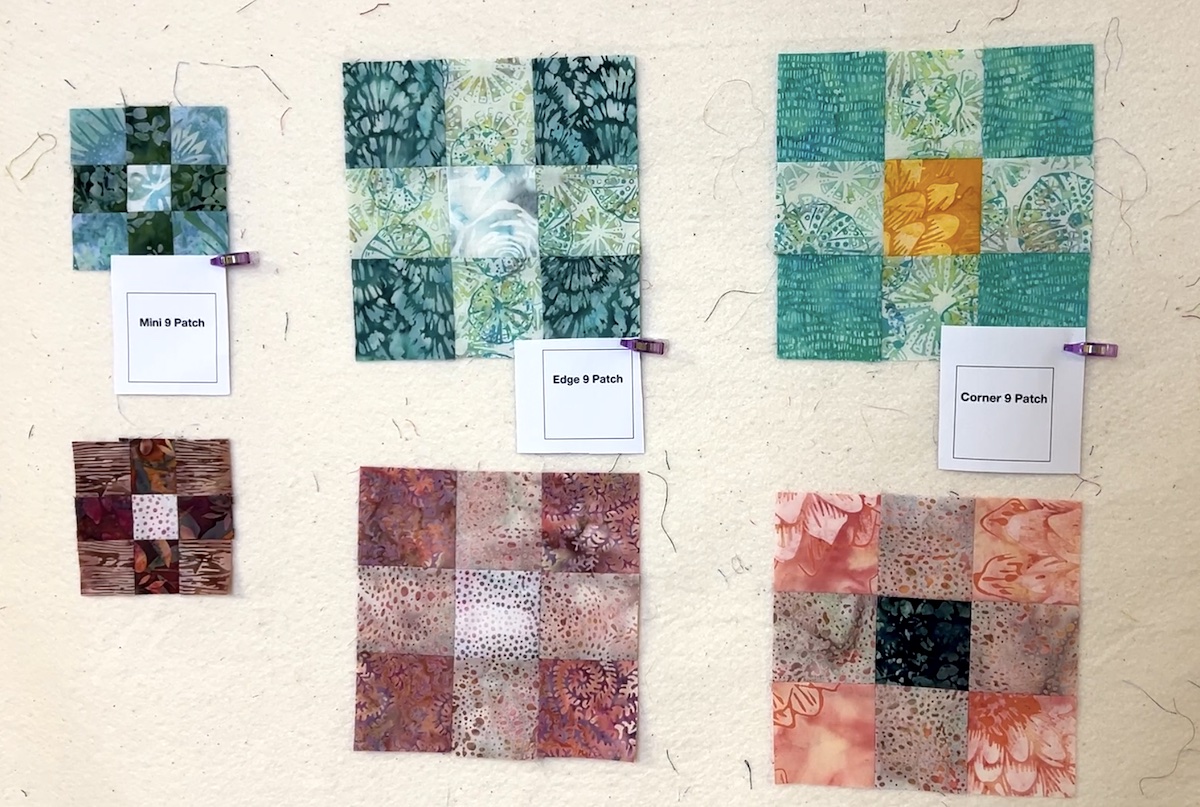 Six nine patch units on a design wall.